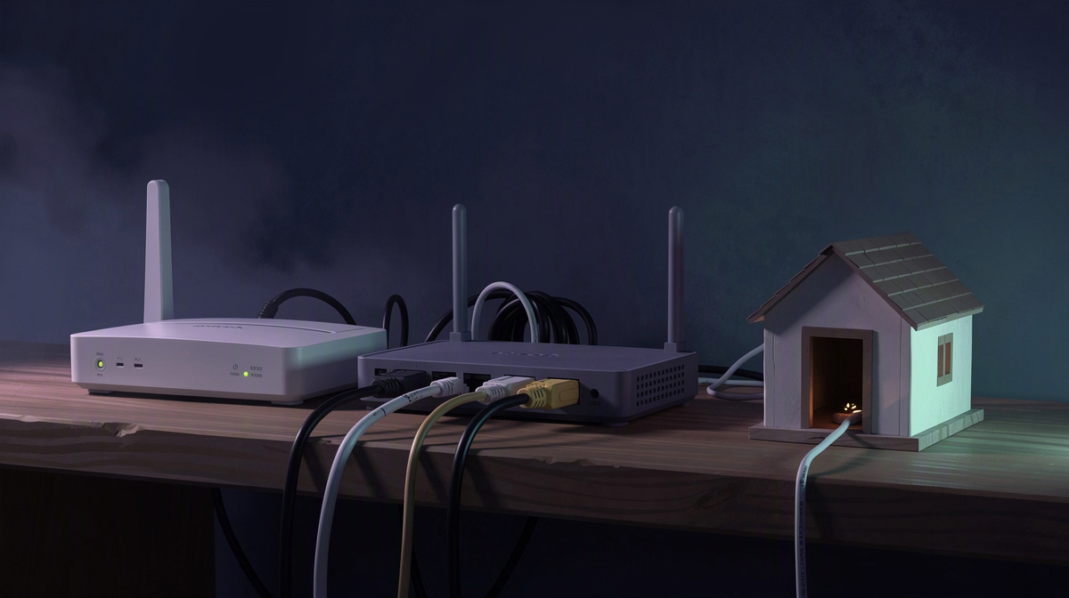 Router and modem beside a small house model with an open doorway